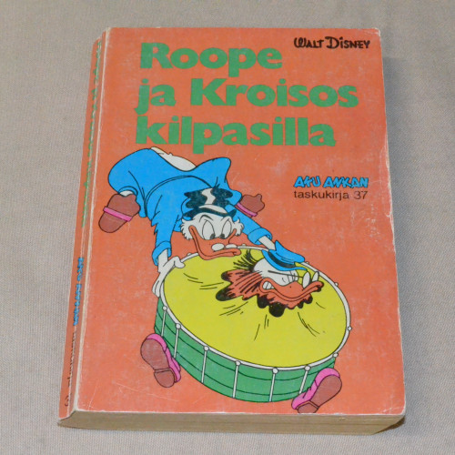 Aku Ankan taskukirja 37 Roope ja Kroisos kilpasilla (1.p.)